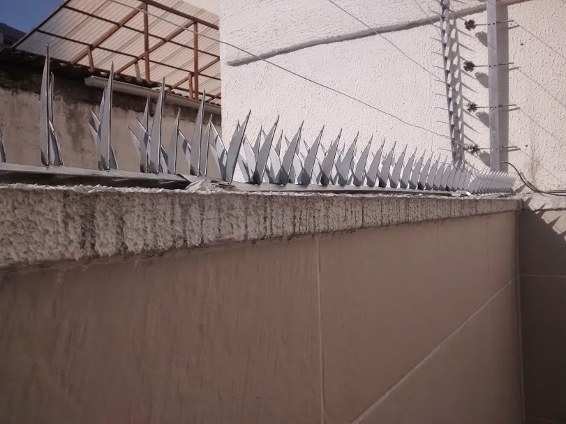 trabalho realizado com lança para muro